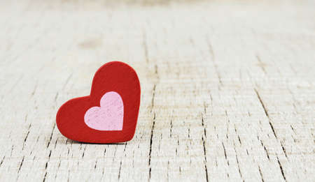 Red hearts on the old wooden with background.の写真素材
