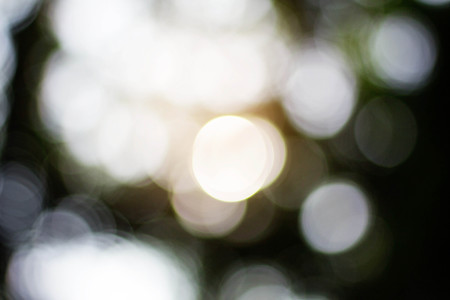 Colorful and beautiful bokeh on the natural background.の写真素材