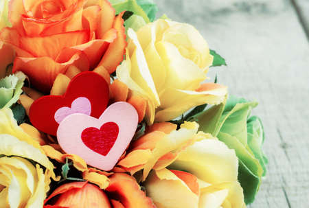 Heart and roses on wooden floor with colorful of beauty.の写真素材