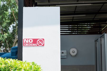 Bathrooms and banners are no smoking in the park.の写真素材
