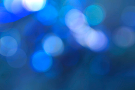 Bokeh of circle on the blue background.