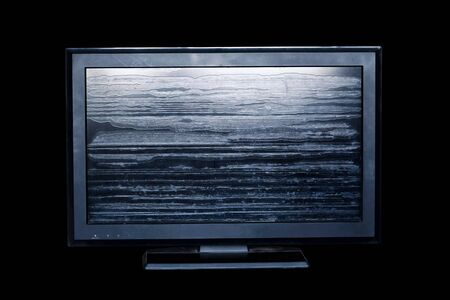 Old television of screen broken on black background.の写真素材