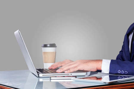Young businessman with computer of working on desk.の写真素材