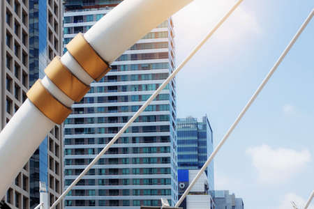 Bridges and office buildings with sky in thailand.の写真素材