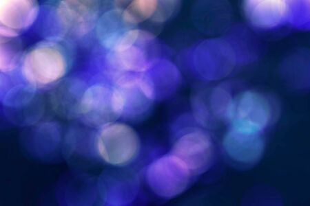 Colorful of bokeh colors on the blue background.の写真素材