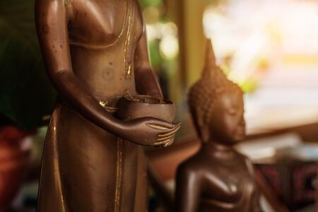 Buddha carries a bowl in the temple of Thailand.の写真素材