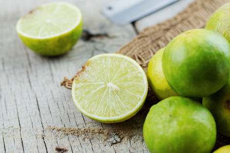 Lemon slices cut on the old wooden floor.の写真素材