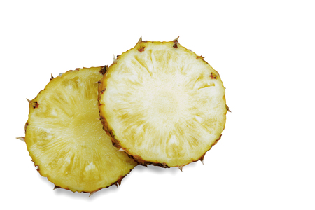 Pineapple cut of ripe on a white background.の写真素材