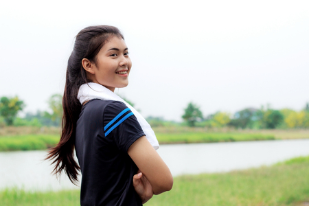 Girl of smiling after exercising in a park.の写真素材