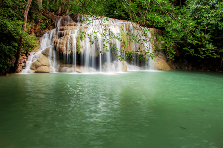 Erawan waterfall in the spring with beautiful of Thailand.の写真素材