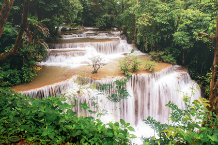 Huay mae kamin waterfall with beautiful in the rainy season at sunrise.の写真素材