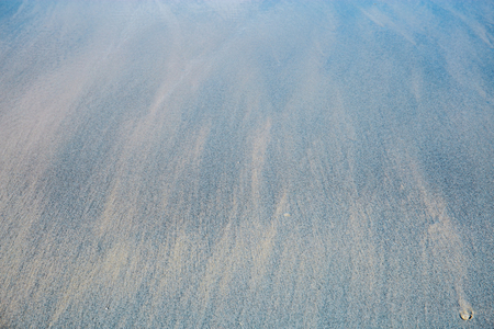 Beach with dirt of the sea at sunlight.の写真素材