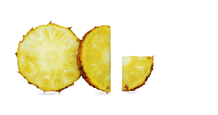 Pineapple of slices on a white background.の写真素材
