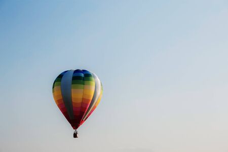 Colorful of balloon on the blue sky at sunlight.の写真素材