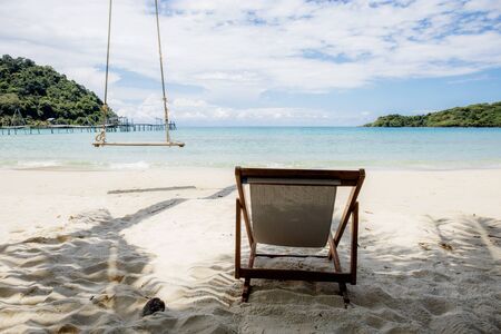 Chair for relaxing on beach with the sunlight in summer.の写真素材