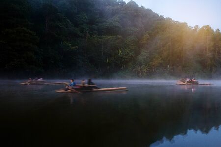 Travel on bamboo rafting in river at Pang Oung District Animal Area.の写真素材