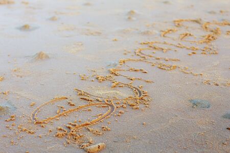 Text on sand with the background.の写真素材