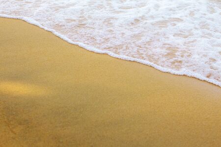 Waves on sand beach at the sea.の写真素材