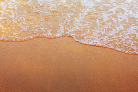 Waves on sand with beautiful at the sea.
