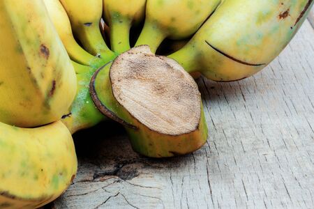 Banana of ripe on the old wooden background.の写真素材
