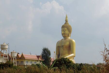 Big Buddha in fields of the countryside.の写真素材