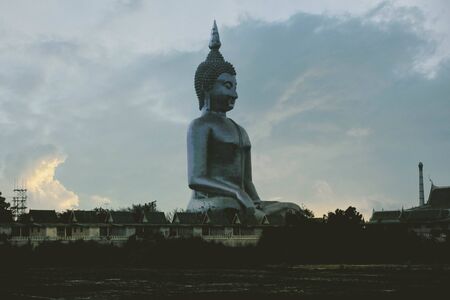 Buddha in the temple with art and architecture of old.の写真素材