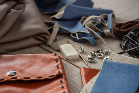 Leather and repair equipment on wooden floors.の写真素材