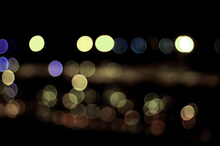 Colorful of bokeh on street at night.