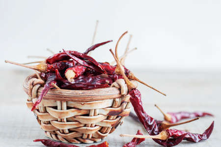 Dried chilli
in bowl with a white background.の写真素材