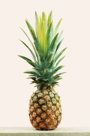 Pineapple fresh on wooden with gray background.の写真素材
