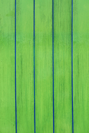 Green wooden planks background close up.の写真素材