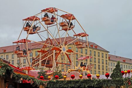 Saxony, Germany. 12/22/2018 year. Christmas Market in Dresden. Giant Christmas Wheel.のeditorial素材