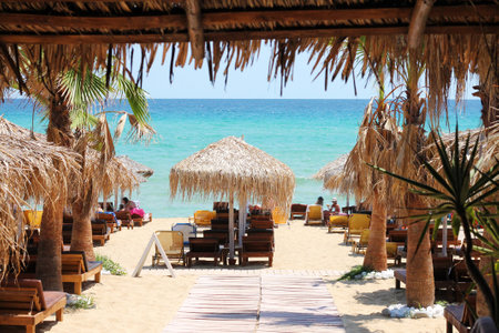 Popular greece beach - Ammolofoi. View of the beach on the Aegean coast. Nea Peramos, Kavala, Northen Greece.の写真素材