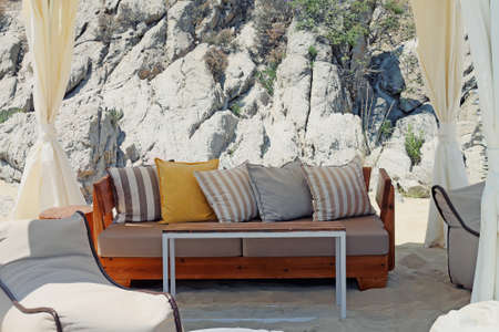 Luxury greek beach relax zone. Summer holidays at Aegian sea.
