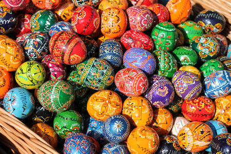 Colorful painted easter eggs for sale at a market stall. Traditional Czech easter eggs.の写真素材