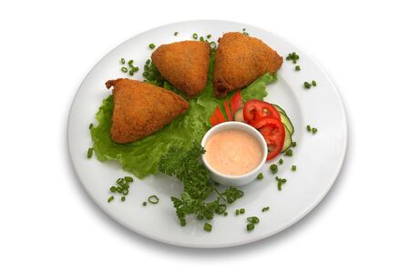puff pastry with mushrooms and meat, on lettuce leaves, served with special rose sauce