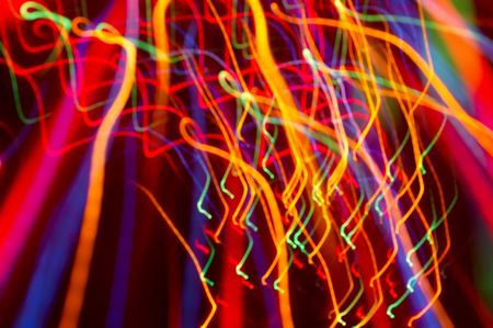 abstract background: colored light motion blurs #1の写真素材
