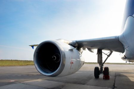 airplane staying at parking on the airfield