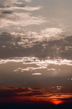 dramatic red with silver sunset over the sea