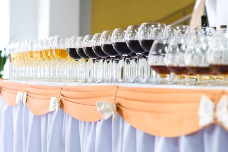 many wine glasses on the banquet table, selective focus, very shallow DOFの写真素材