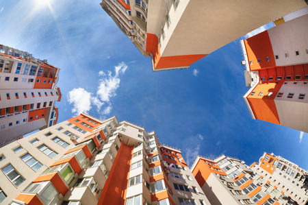 Fisheye shot of new apartments buildings exterior Fisheye shot of new apartments buildings exterior