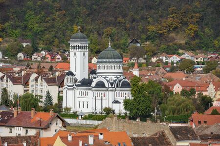 View of the cityscape and Orthodox Christian church in Sighisoara town, Romaniaの写真素材