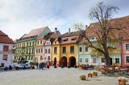 Sighisoara, Romania - October 19th, 2016: Famous view of central square in historic part of Sighisoara, Transylvania region, Romaniaのeditorial素材