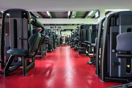 Modern gym interior with equipmentの写真素材