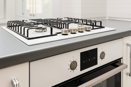 Brand new gas stove and embedded ovenの写真素材