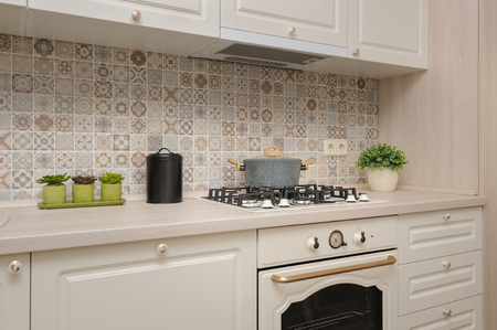 Modern beige colored kitchen and dining roomの写真素材