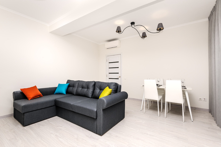 Modern white and gray living room interiorの写真素材