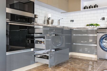 Luxury modern white, beige and grey kitchen interiorの写真素材