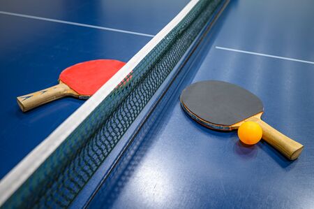 table tennis bats and ball