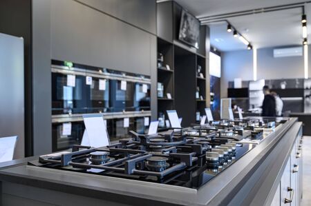 Brand new gas stoves and refrigerators home appliance retail storeの写真素材